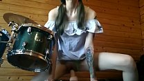 musician takes time out to suck and fuck a dildo on her drum set